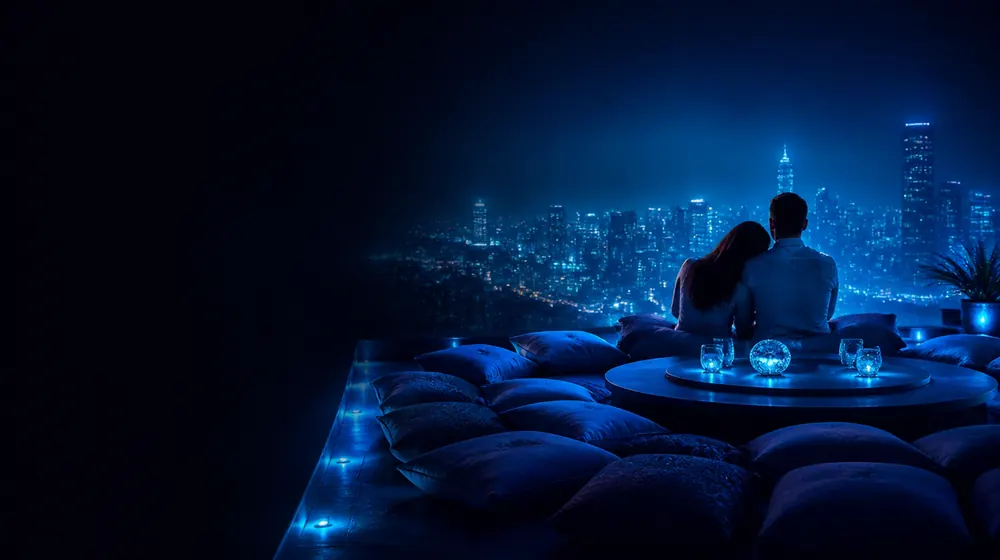Orgy OnlyFans creators — couple embracing on a rooftop above a glowing city, a ring of many cushions around the low table